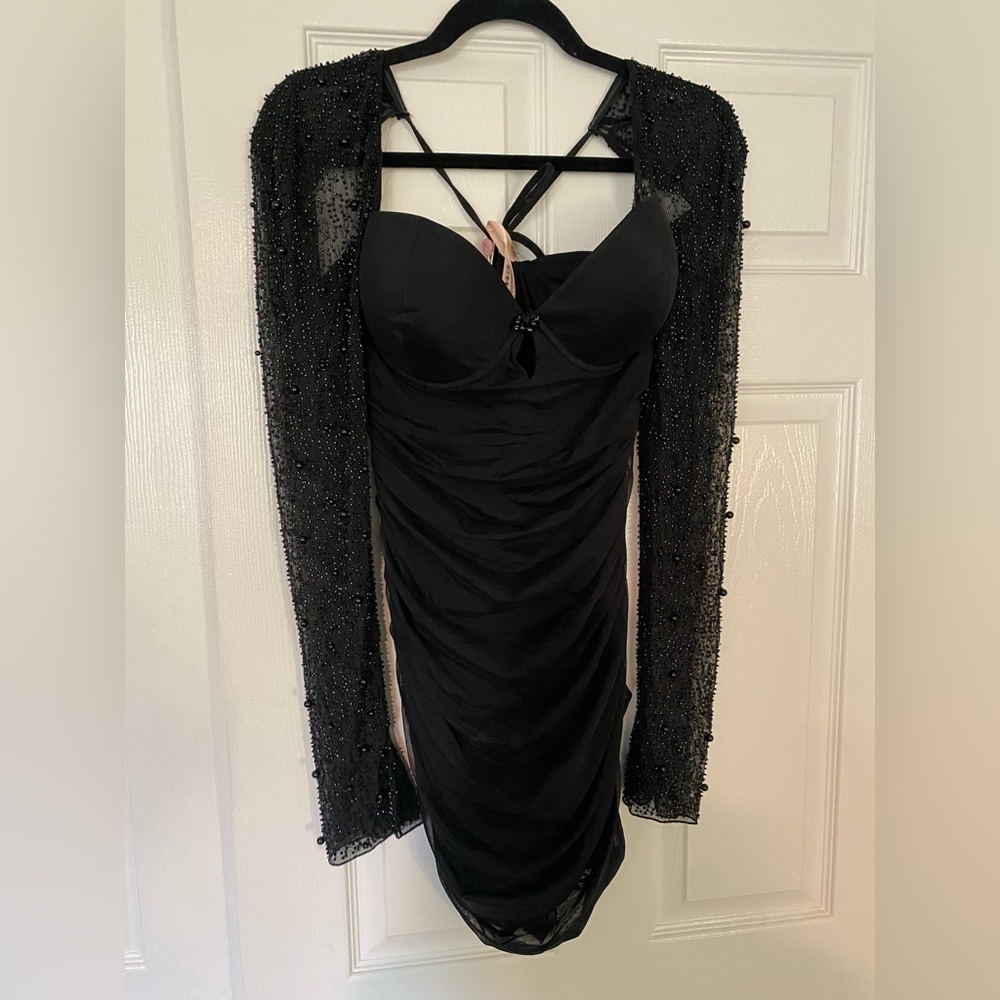 oh polly size 8 plus cup 
Embellished long sleeve mini dress in black